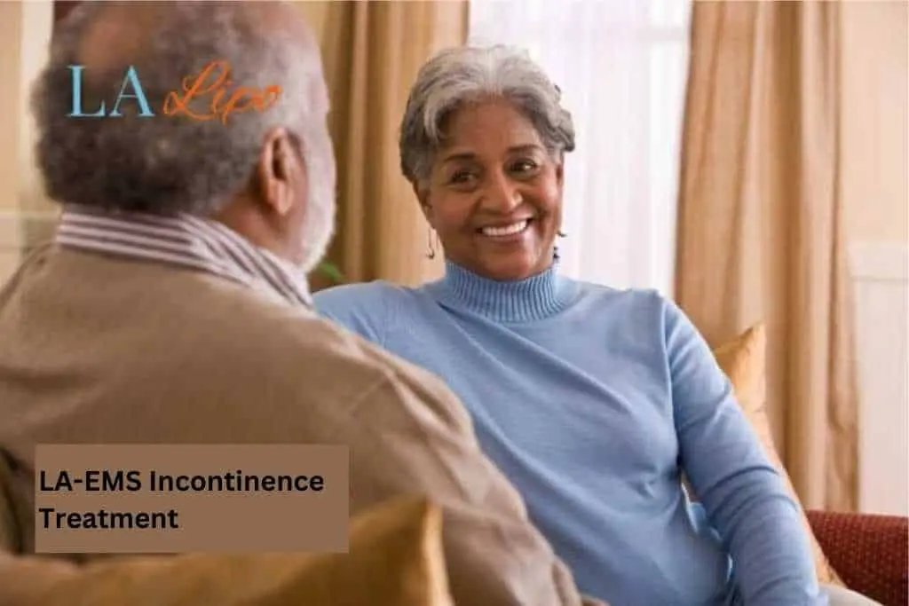 Couple sat smiling at each other - LA-EMS treatment Hockley